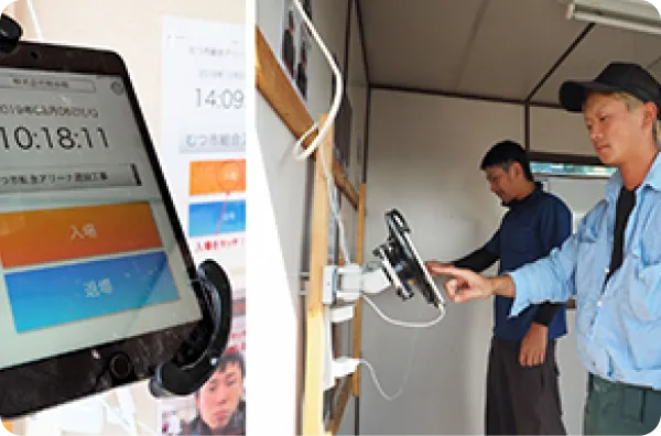 建設現場の作業員が顔認証で入退場登録を行っている様子