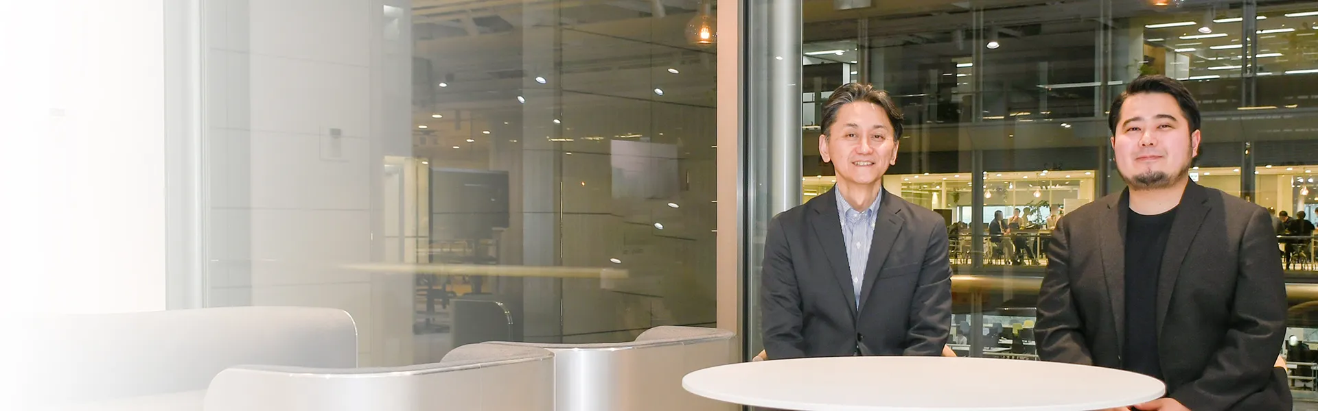 NEC スマートインダストリー統括部 シニアビジネスプランナー 北野 芳直とNEC スマートインダストリー統括部 塚田 和也