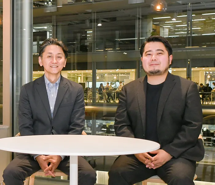 NEC スマートインダストリー統括部 シニアビジネスプランナー 北野 芳直とNEC スマートインダストリー統括部 塚田 和也