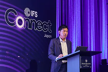 IFS Connect Japan 2026で講演するNEC清水治彦の様子