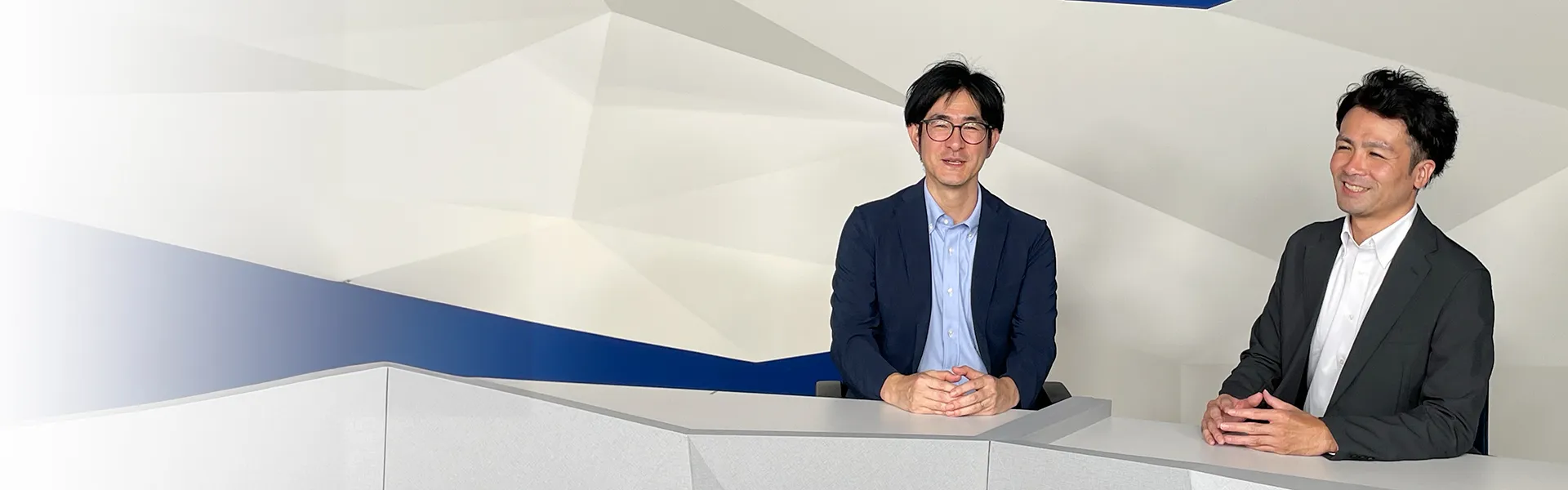 NEC 製造システム統括部 主任 吉見光とNEC スマートインダストリー統括部 主任 鍋島弘樹