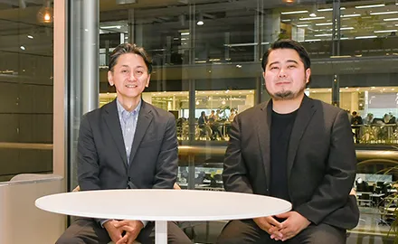 NEC スマートインダストリー統括部 シニアビジネスプランナー 北野 芳直とNEC スマートインダストリー統括部 塚田 和也